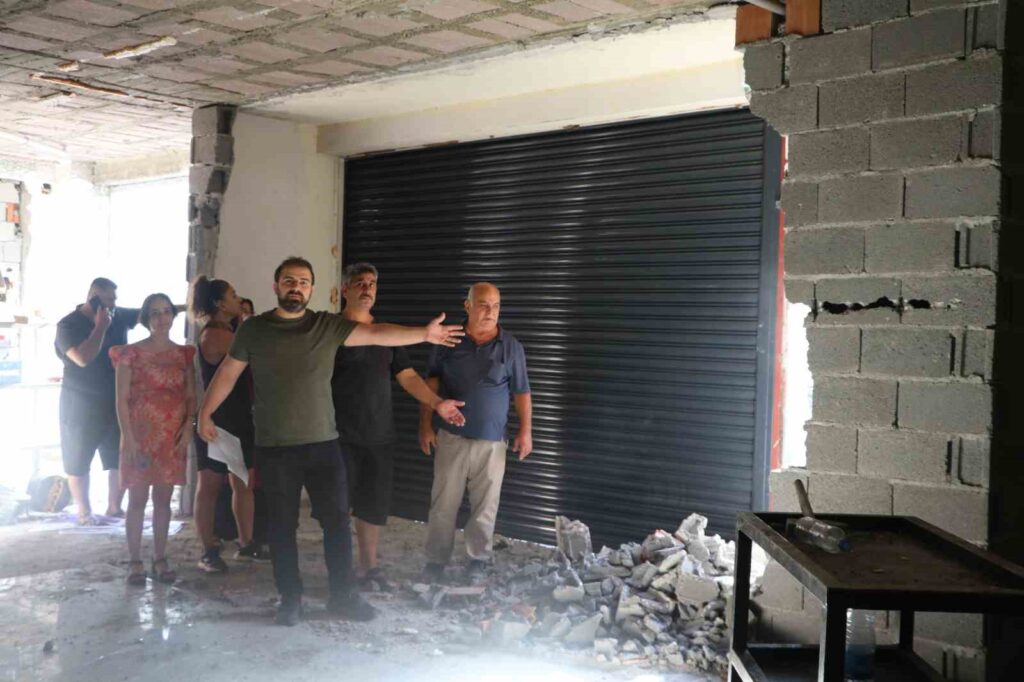 apartman yonetimi ile is yeri sahibi arasinda perde duvar tartismasi f1454ca