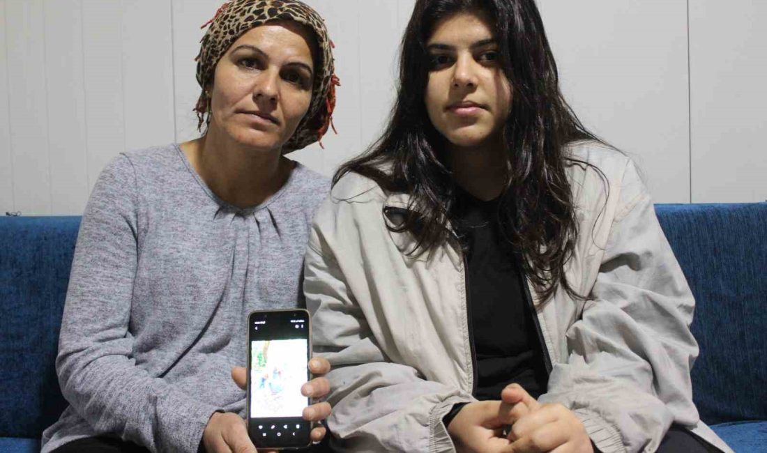 SOLDAKİ TÜRBANLI  MERAL KANAT, O GECEYİ ANLATTI