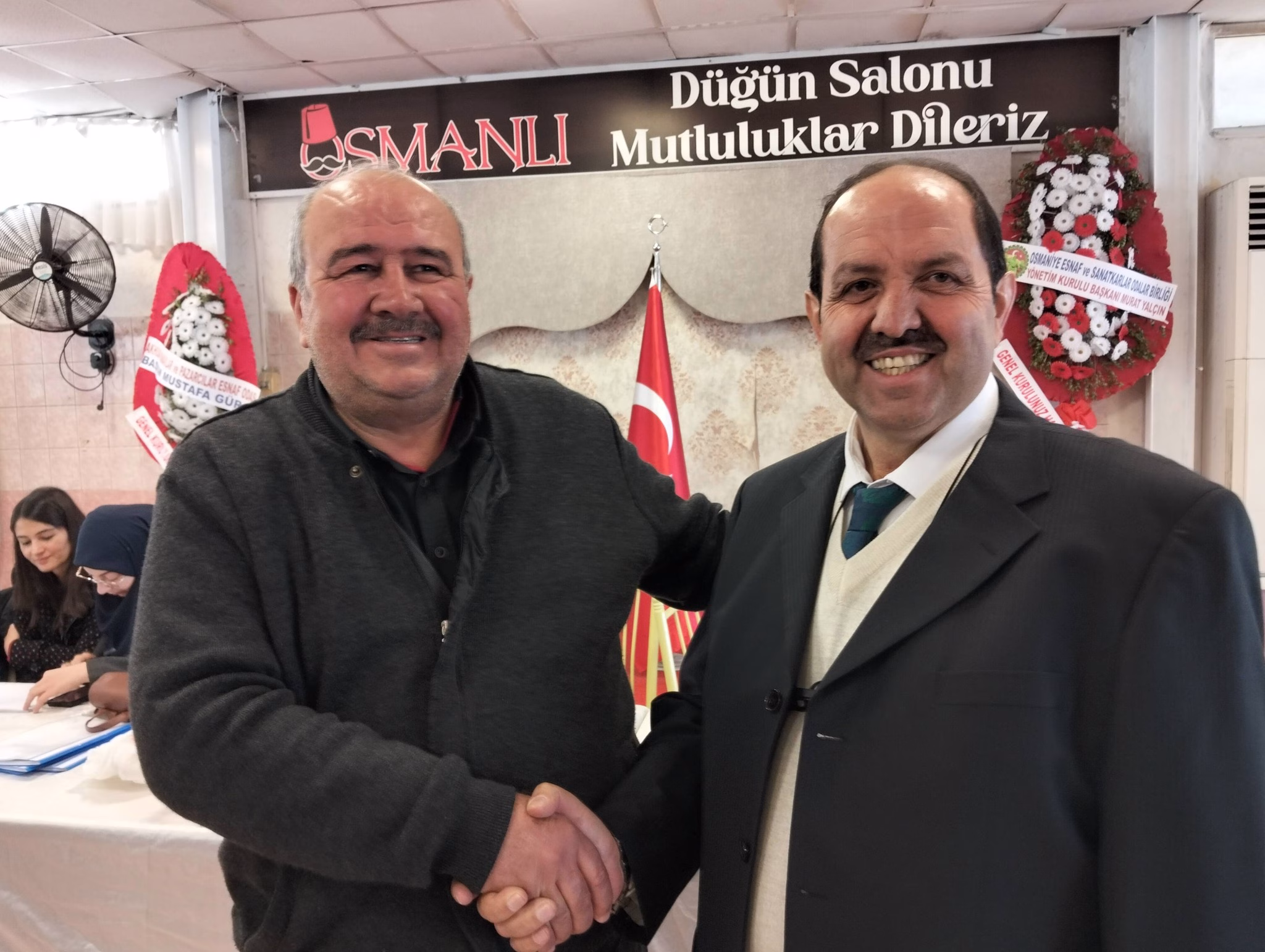 20 YILIN ARDINDAN AHMET BAYRAL'DAN MURAT DELİKİŞİ'YE GÖREV DEVRİ n