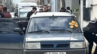 Kahramanmaraş’ın Dulkadiroğlu ilçesinde otomobiline binmek isteyen bir kişi, kayınbiraderinin silahlı
