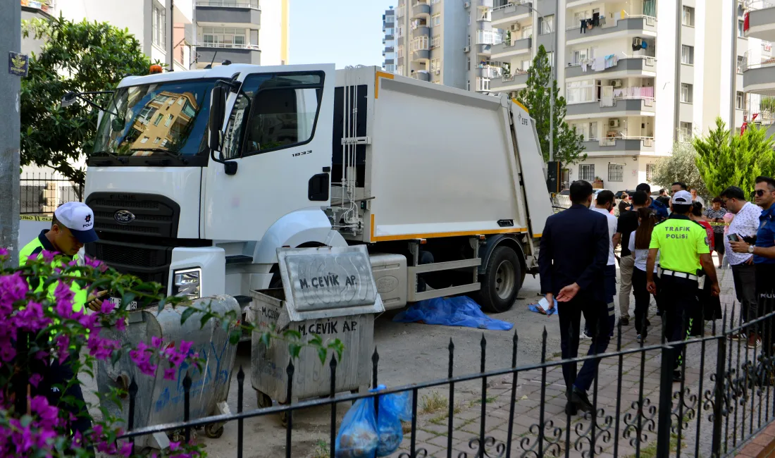 Yolun karşısına geçmek isterken belediyenin çöp kamyonunun altında kalan 71
