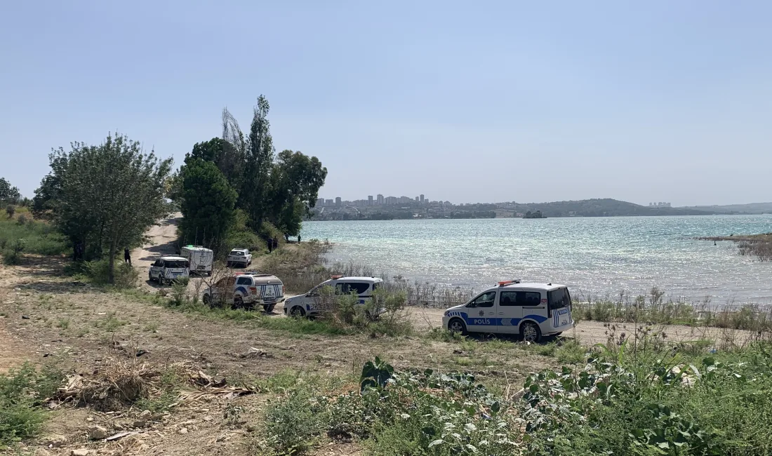 Ailesiyle gittiği piknikte, çocuğunun suya düşen terliğini almak için girdiği